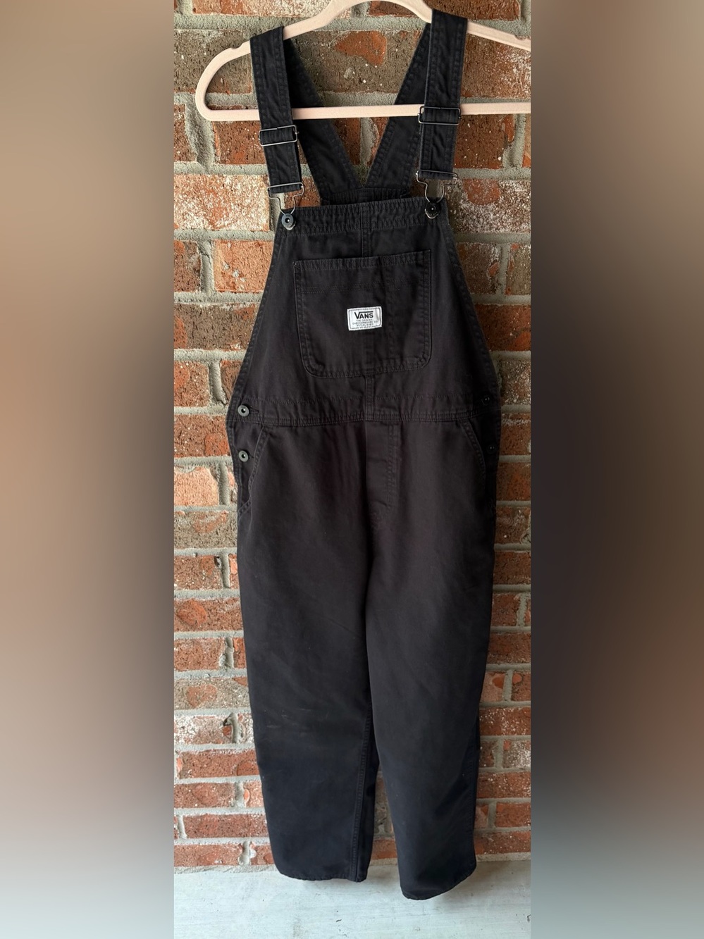 Vans Women's Ground Work Overalls in black. Size small